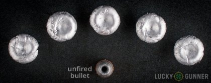 View from up above of fired Remington .357 Magnum bullets compared to an unfired round