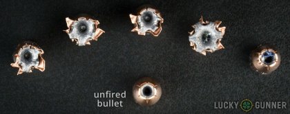 View from up above of fired Hornady .40 S&W (Smith & Wesson) bullets compared to an unfired round
