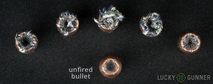 View from up above of fired Speer .40 S&W (Smith & Wesson) bullets compared to an unfired round