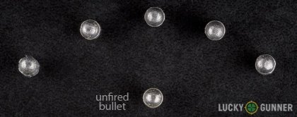 View from up above of fired Federal .22 Long Rifle (LR) bullets compared to an unfired round