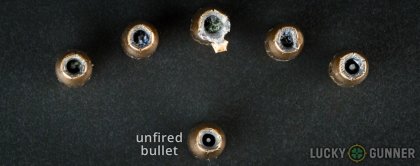 View from up above of fired Federal 9mm Luger (9x19) bullets compared to an unfired round