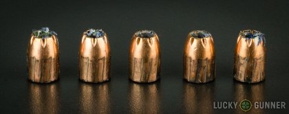 View from up above of fired Remington .45 ACP (Auto) bullets compared to an unfired round