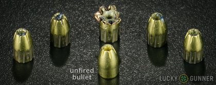 View from up above of fired Magtech 9mm Luger (9x19) bullets compared to an unfired round