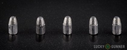 Side by side comparison of an unfired Federal .22 Long Rifle (LR) bullet vs. the unfired round