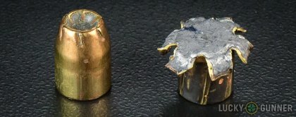 View from up above of fired Remington .40 S&W (Smith & Wesson) bullets compared to an unfired round