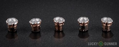 Side by side comparison of an unfired Hornady .32 H&R Magnum bullet vs. the unfired round