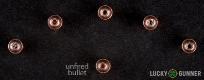 View from up above of fired CCI .22 Magnum (WMR) bullets compared to an unfired round