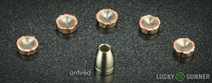 View from up above of fired Liberty Ammunition 9mm Luger (9x19) bullets compared to an unfired round