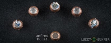 View from up above of fired Federal 10mm Auto bullets compared to an unfired round