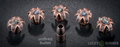 View from up above of fired Barnes .357 Magnum bullets compared to an unfired round