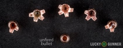 View from up above of fired Buffalo Bore .32 Auto (ACP) bullets compared to an unfired round