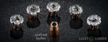 Side by side comparison of an unfired Federal 10mm Auto bullet vs. the unfired round