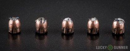Line-up of Silver Bear 9mm Makarov (9x18mm) ammunition - fired vs. unfired