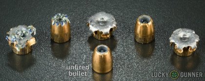 Side by side comparison of an unfired Federal .45 ACP (Auto) bullet vs. the unfired round