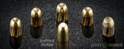 Image displaying fired 10mm Auto rounds compared to an unfired bullet