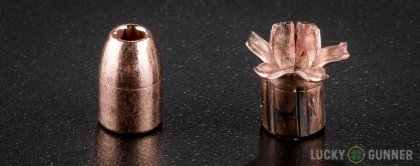 Side by side comparison of an unfired Buffalo Bore .32 Auto (ACP) bullet vs. the unfired round