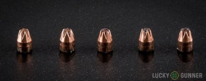 Image displaying fired .25 Auto (ACP) rounds compared to an unfired bullet