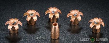Side by side comparison of an unfired Corbon 9mm Luger (9x19) bullet vs. the unfired round