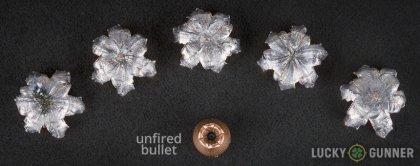View from up above of fired Winchester .40 S&W (Smith & Wesson) bullets compared to an unfired round