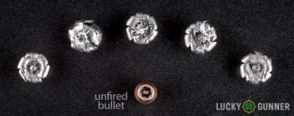 Side by side comparison of an unfired Federal .32 Auto (ACP) bullet vs. the unfired round