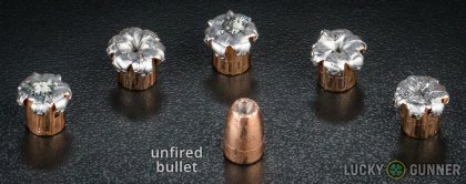Image displaying fired 9mm Luger (9x19) rounds compared to an unfired bullet