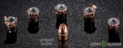 View from up above of fired Hornady .32 H&R Magnum bullets compared to an unfired round