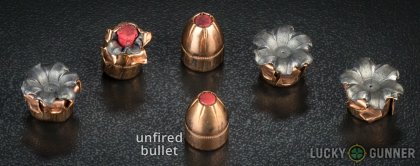 View from up above of fired Hornady .45 ACP (Auto) bullets compared to an unfired round