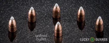 Line-up of Winchester .22 Magnum (WMR) ammunition - fired vs. unfired