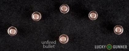 Side by side comparison of an unfired Remington .22 Long Rifle (LR) bullet vs. the unfired round