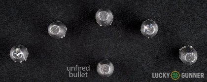 View from up above of fired Sellier & Bellot .32 (Smith & Wesson) Long bullets compared to an unfired round