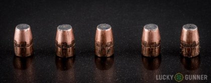 Side by side comparison of an unfired Federal .327 Federal Magnum bullet vs. the unfired round