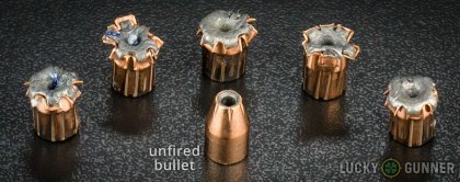 Side by side comparison of an unfired Fiocchi 9mm Luger (9x19) bullet vs. the unfired round